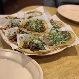 a plate of tacos on a table