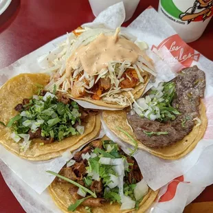 Left tacos: tripas (crispy) Right tacos: camaron and cecina