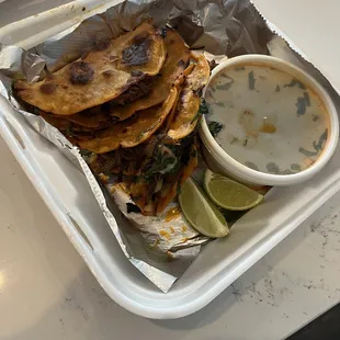 Four ala carte birria tacos and consumme. Yum!