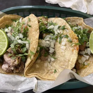 Carnitas and Al pastor tacos.