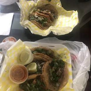 two plates of tacos
