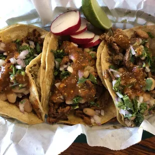 Three amazing tacos, on the left-Chorizo, middle-Pastor, right-Asada.