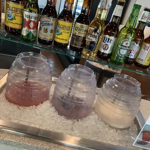 Mexican drinks : i only know the middle is agua Fresca I think or maybe the left