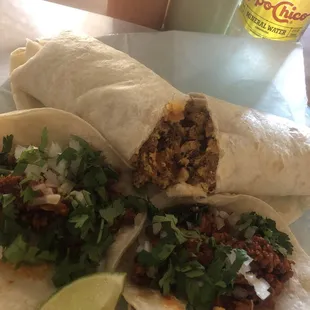 Two tacos al pastor...They are good. Now, the burrito (egg, potatoes and chorizo) is heavenly good.