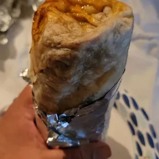 Very big and delicious burrito. Probably should on eat half , but it tasted so good I had to deal with feeling full the rest of the day.