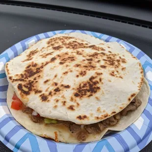 Quesadilla super with carne asada! Tons of meat, sour cream and guac inside