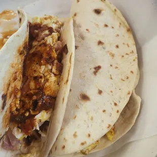 3 breakfast tacos- bacon and egg with red salsa
