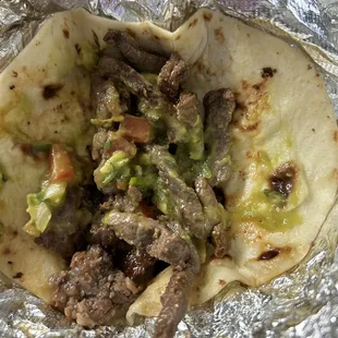 a burrito wrapped in foil