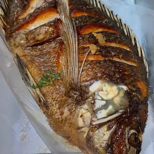 a whole fish on a plate