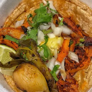 Street style tacos, slice of pineapple