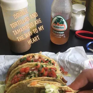 I got four tacos total, one of each meat, with Pico de Gallo and lettuce. Hit them with some lime and house made hot sauce. So good.