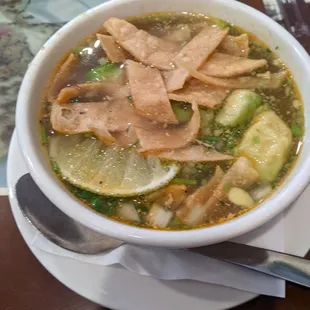Cup of chicken tortilla soup - strong, good lime flavor. This one isn't tomato-based.