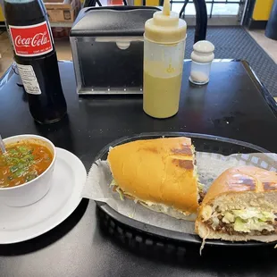 Fajita torta ,  charro beans and a coke