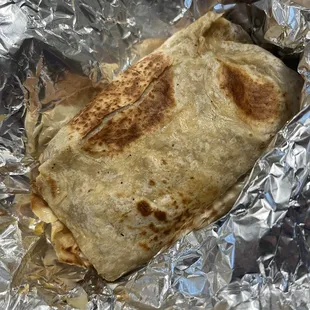 Whole burrito that is actually in a cooked tortilla