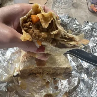Burrito with carne molida. Other Tex mex places take note on how a flour tortilla should be served!! Cooked not raw