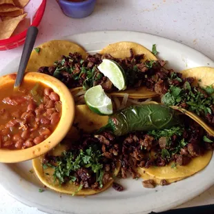 The taqueria plate is very good with ranchero beans that are superb.