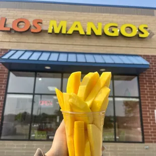 Fresh cut mango cups also you can add chamoy and tajin !!!