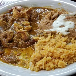 Spicy shrimp with bland rice and beans. Sauce was so mouth burning hot you couldn't even taste the shrimp.