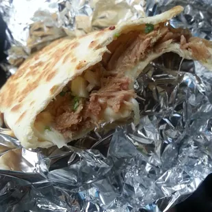 Nothing like a quesadilla con carnitas that screams homey sticks to your insides food!