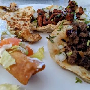 Flautas, quesadillas (chicken), tacos al pastor (pork), and tacos asada (grilled beef)