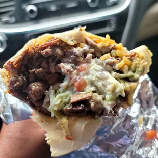 Cross section of my super burrito at Los Pericos on 8/3/23