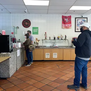 a man standing at a counter