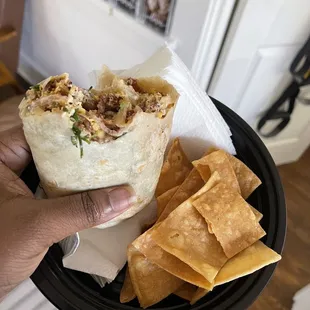 Breakfast Burrito  bacon, eggs, cheese, cilantro and onions , sour cream! So darn good!