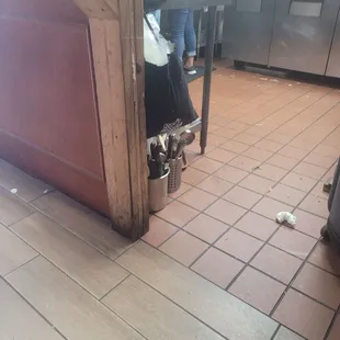 Utensils on floor hope they wash them before they use them