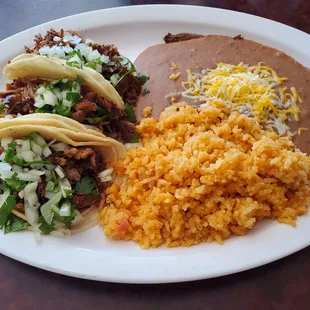 Combo Tacos. 3 tacos, refried beans and rice