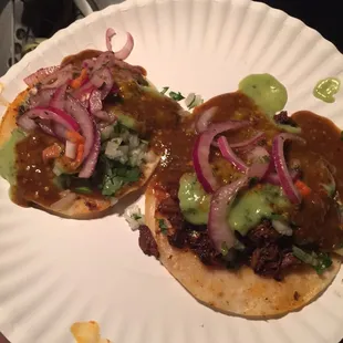 Pastor tacos w/avocado dressing, house made hot salsa and red onions.