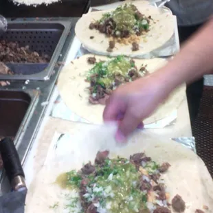 a person making a taqueria