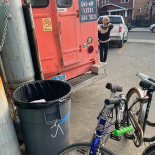 a bicycle parked in front of a food truck