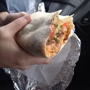 Steak burrito. Also comes with two delicious sauces on the side.