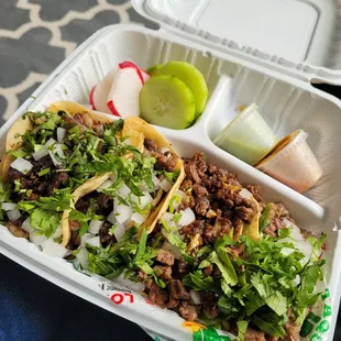 Two carne asada and two barbacoa tacos