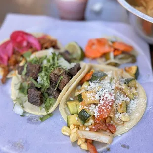 Cochinita pibil, cachetes, and calabazitas tacos