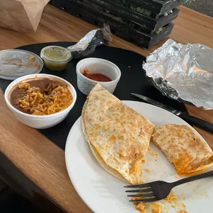 Cheese quesadilla and mixed rice and beans to-go