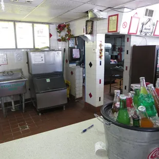 Interior. Behind the counter, kitchen.