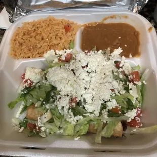 Taquitos.  Shredded chicken always fresh , delicious. Love the crunch never soggy.    We love this taco truck. !!!!!!