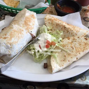 Mexican BBQ beef burrito with one marinated chicken quesadilla and one steak quesadilla.