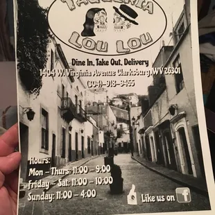 a black and white photo of a street