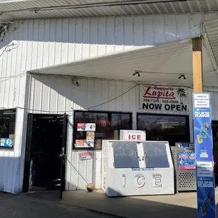 Outside entrance into gas station and taqueria