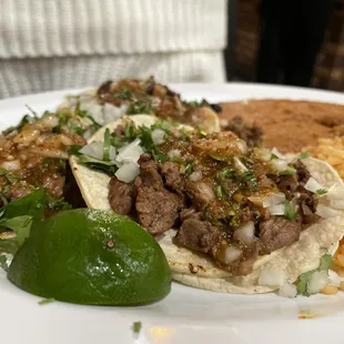 Especial tacos (3) 2- carne asada and 1 Al pastor for $9.99