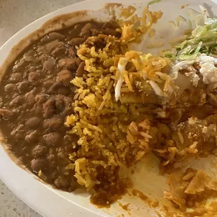 Attempted but gave up . The enchilada plate.