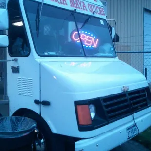 a food truck parked in front of a building