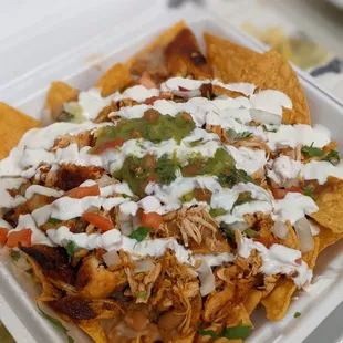 Nachos with pollo $10