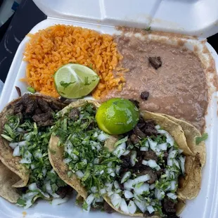 Steak tacos with rice and beans