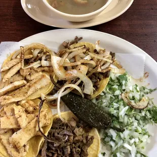 Mini Taquitos, 2 Bistec ( beef ), 2 chicken. Served with charro beans.