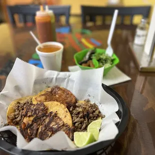 2 carne asada, 1 al pastor, and 1 chicharrónes tacos