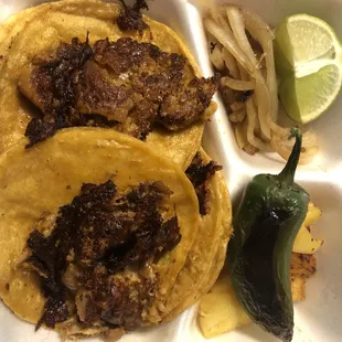 Chicharrón y Al Pastor (underneath)