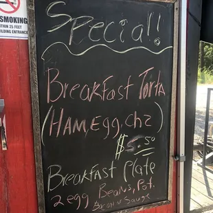 a menu on a chalkboard